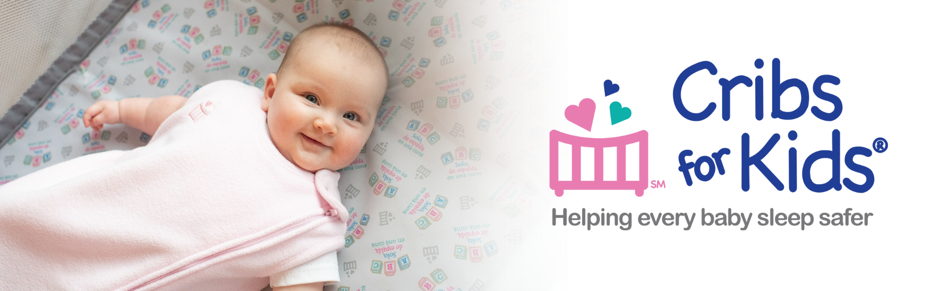 dad and mom holding and smiling at happy baby, WIC logo
